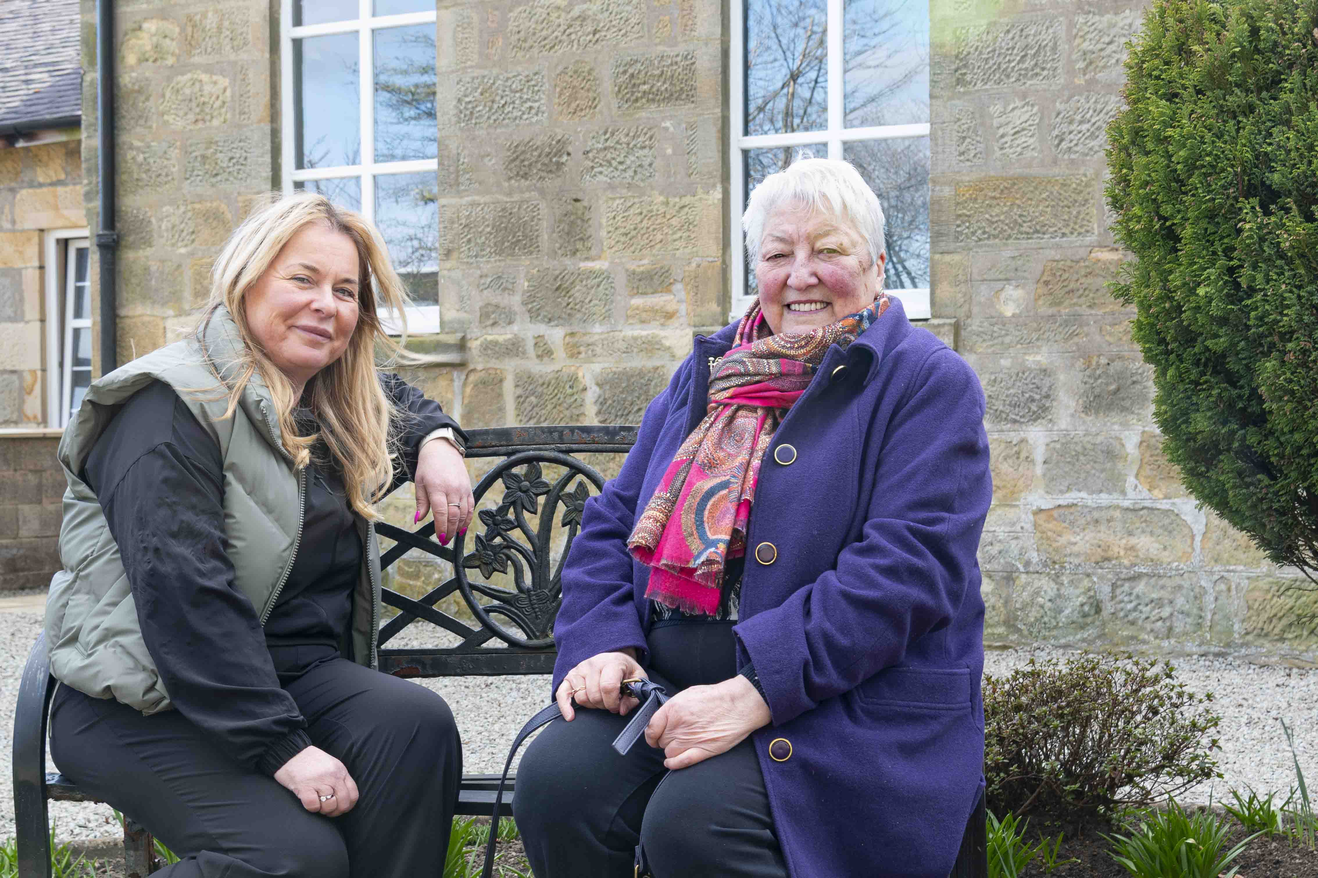 Carolann McPhilimey of CCLP with Marion Wylie outside Lugar Parish Church.